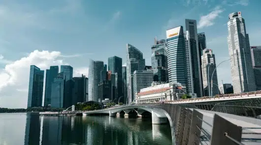 A view of the Singapore financial district and Esplanade Bridge, representing the regulatory environment and top 5 ERP vendors in Singapore.